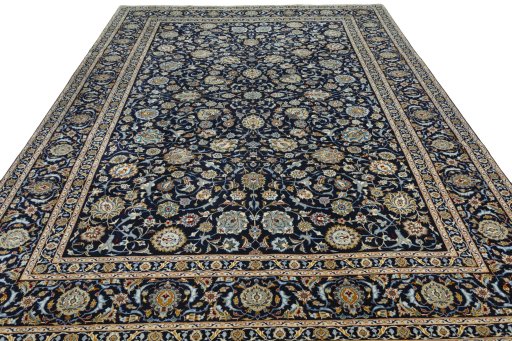 Surface texture of 2000s Kashan rug with natural Wool and intricate pattern