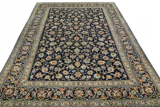 Surface texture of 2000s Kashan rug with natural Wool and intricate pattern