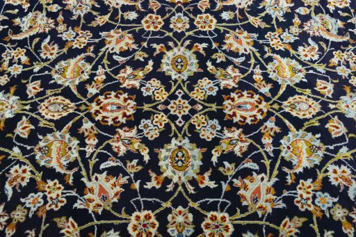 Central medallion detail of 2000s Kashan rug from Iran / Persia