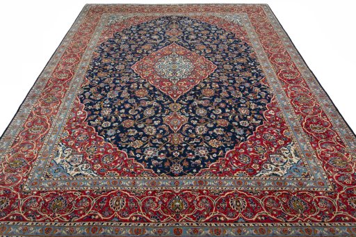 Surface texture of 2000s Kashan rug with natural Cork and intricate pattern