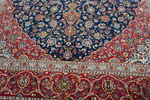 Close-up detail of 2000s Kashan rug from Iran / Persia showing Cork weave