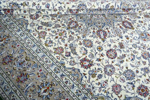 Close-up detail of 2000s Kashan rug from Iran / Persia showing Wool weave