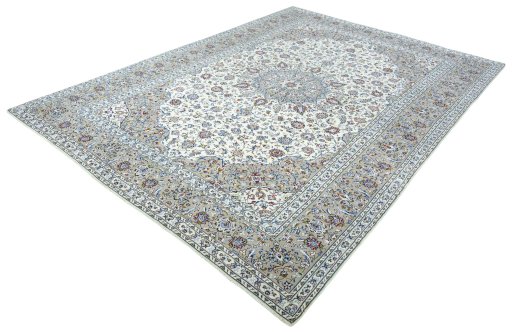 Corner detail of 2000s Kashan rug showing border pattern and Wool pile