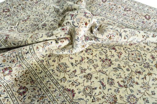 Surface texture of 2000s Kashan rug with natural Wool and intricate pattern
