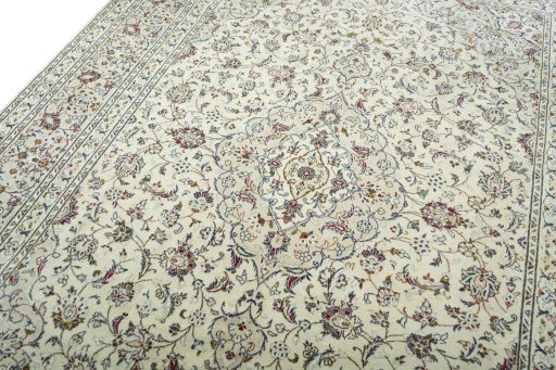Backside of handmade 2000s Kashan rug showing knot structure and weave density