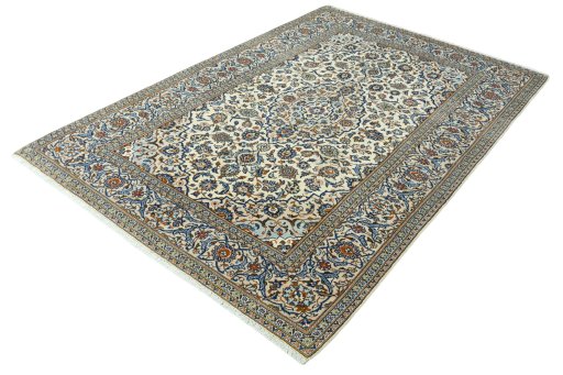 Corner detail of 2000s Kashan rug showing border pattern and Wool pile