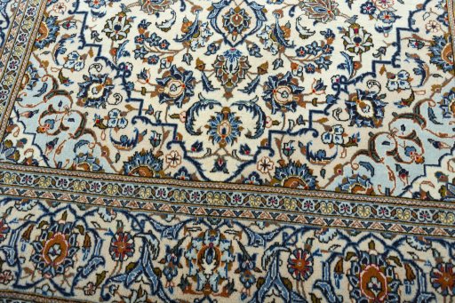 Close-up detail of 2000s Kashan rug from Iran / Persia showing Wool weave