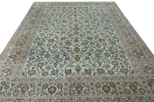 Surface texture of 2000s Kashan rug with natural Wool and intricate pattern