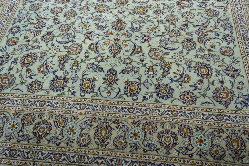 Close-up detail of 2000s Kashan rug from Iran / Persia showing Wool weave