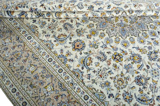Close-up detail of 2000s Kashan rug from Iran / Persia showing Wool weave