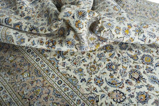Surface texture of 2000s Kashan rug with natural Wool and intricate pattern