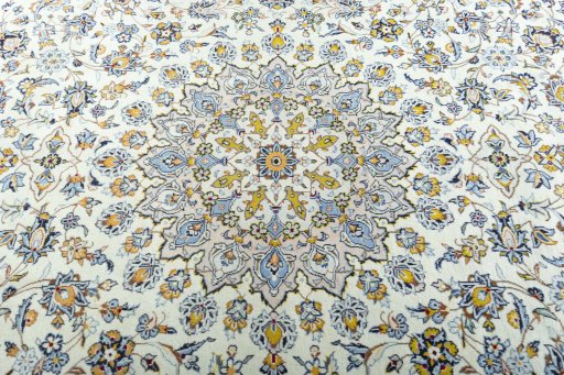 Central medallion detail of 2000s Kashan rug from Iran / Persia