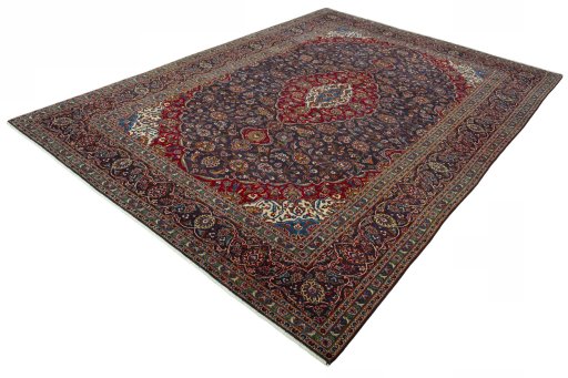 Corner detail of 2000s Kashan rug showing border pattern and Wool pile