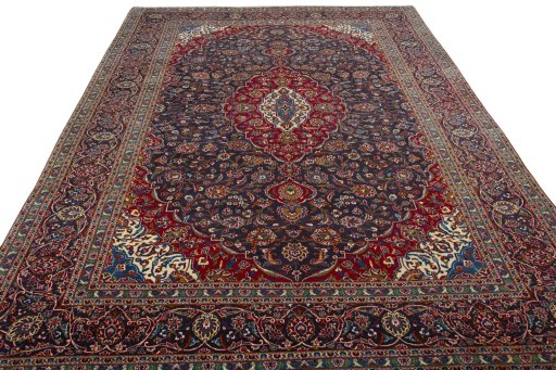 Surface texture of 2000s Kashan rug with natural Wool and intricate pattern