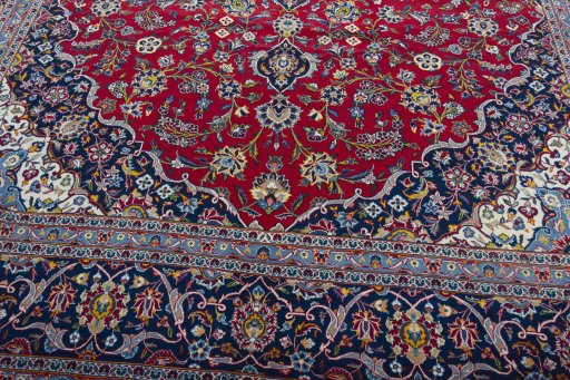 Close-up detail of 2000s Kashan rug from Iran / Persia showing Wool weave
