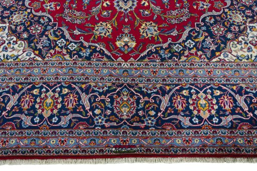 Full view of 2000s Kashan rug from Iran / Persia, 444 × 322 cm in Red tones