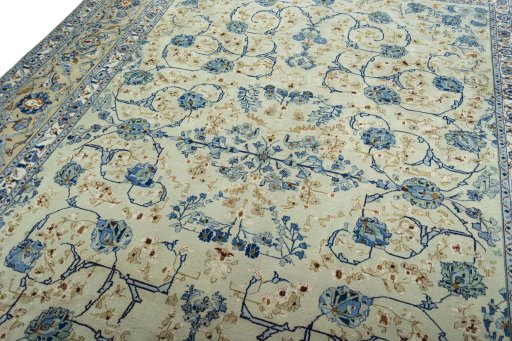 Backside of handmade 2000s Kashan rug showing knot structure and weave density