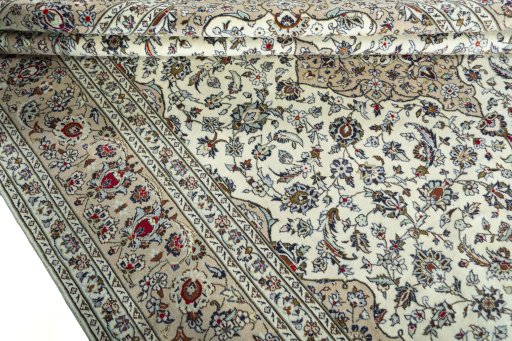 Close-up detail of 2000s Kashan rug from Iran / Persia showing Wool weave