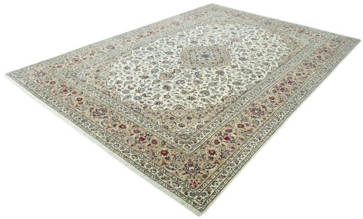 Corner detail of 2000s Kashan rug showing border pattern and Wool pile