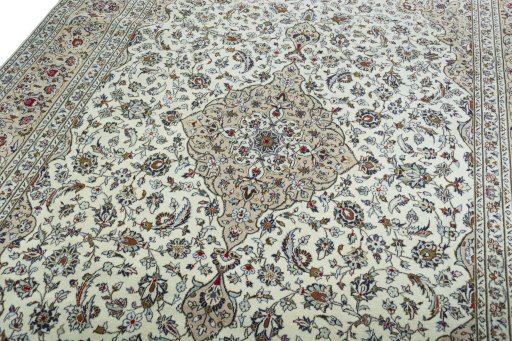 Backside of handmade 2000s Kashan rug showing knot structure and weave density