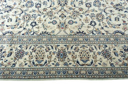 Surface texture of 2000s Kashan rug with natural Wool and intricate pattern