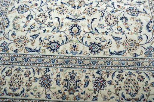 Full view of 2000s Kashan rug from Iran / Persia, 300 × 194 cm in Beige tones