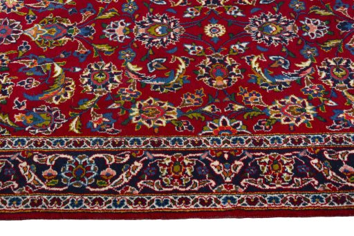 Close-up detail of 2000s Kashan rug from Iran / Persia showing Wool weave