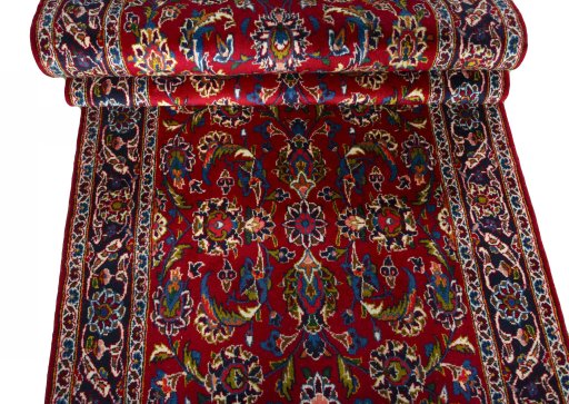 Full view of 2000s Kashan rug from Iran / Persia, 420 × 104 cm in Red tones