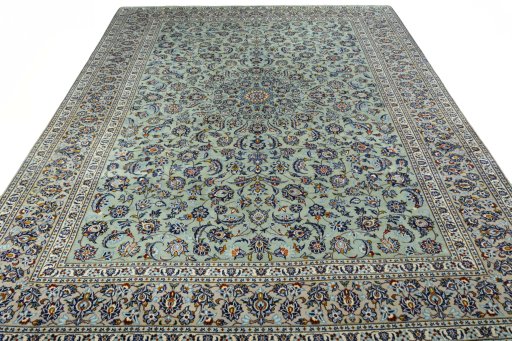 Surface texture of 2000s Kashan rug with natural Wool and intricate pattern