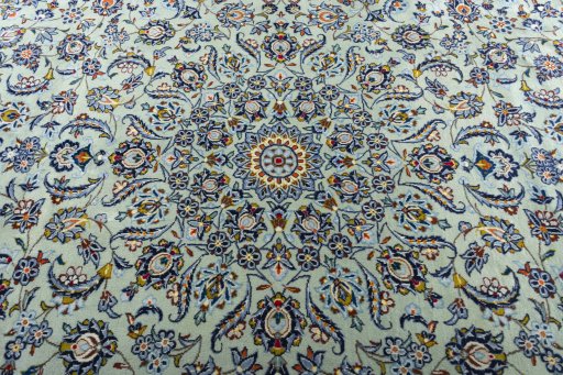 Central medallion detail of 2000s Kashan rug from Iran / Persia