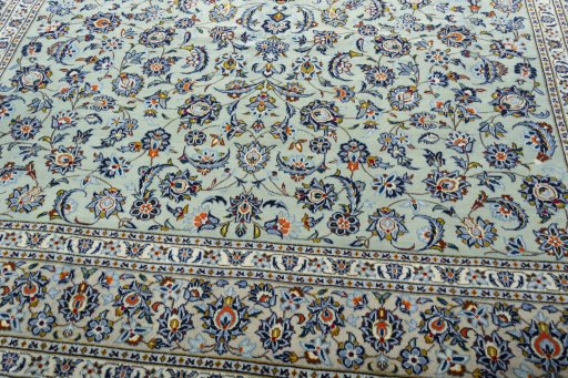 Close-up detail of 2000s Kashan rug from Iran / Persia showing Wool weave