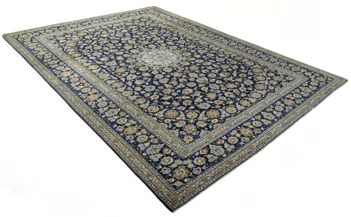 Close-up detail of 2000s Kashan rug from Iran / Persia showing Wool weave