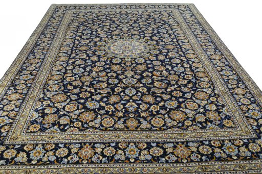 Surface texture of 2000s Kashan rug with natural Wool and intricate pattern