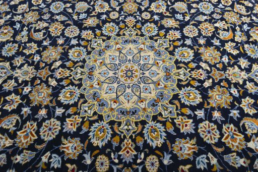 Central medallion detail of 2000s Kashan rug from Iran / Persia