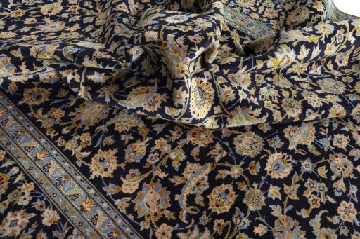 Surface texture of 2000s Kashan rug with natural Wool and intricate pattern