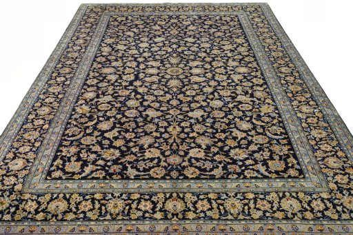Surface texture of 2000s Kashan rug with natural Wool and intricate pattern