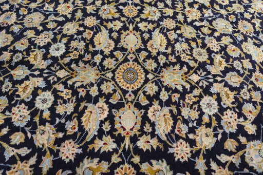Central medallion detail of 2000s Kashan rug from Iran / Persia