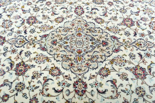 Central medallion detail of 2000s Kashan rug from Iran / Persia