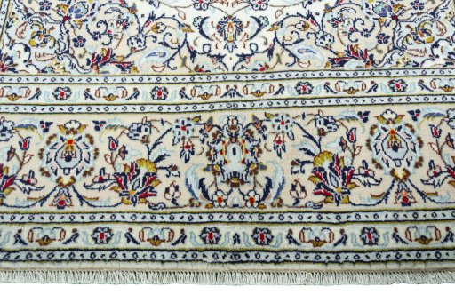 Full view of 2000s Kashan rug from Iran / Persia, 300 × 191 cm in Beige tones