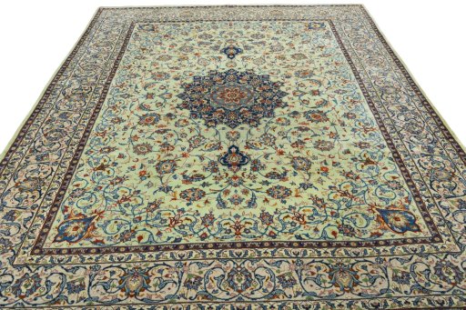 Surface texture of 2000s Kashan rug with natural Wool and intricate pattern