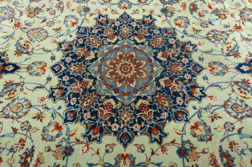 Central medallion detail of 2000s Kashan rug from Iran / Persia