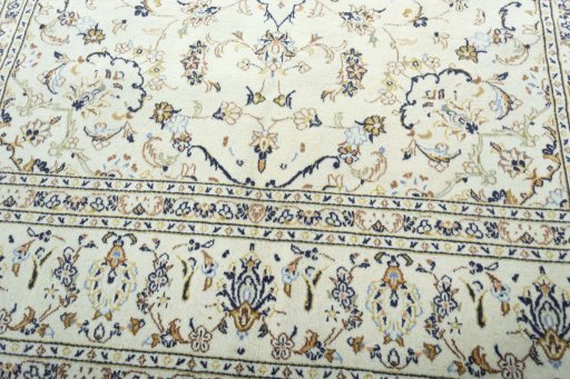 Close-up detail of 2000s Kashan rug from Iran / Persia showing Wool weave