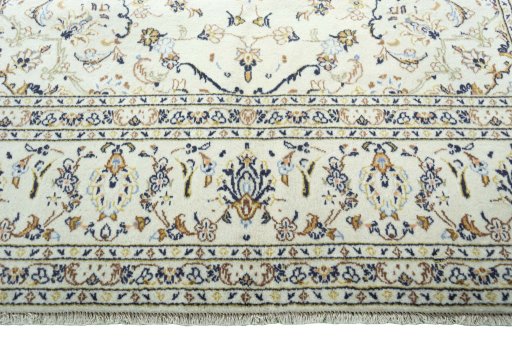 Full view of 2000s Kashan rug from Iran / Persia, 290 × 200 cm in Beige tones