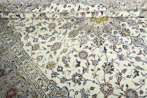 Close-up detail of 2000s Kashan rug from Iran / Persia showing Wool weave