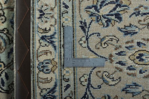 Surface texture of 2000s Kashan rug with natural Wool and intricate pattern
