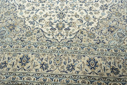 Close-up detail of 2000s Kashan rug from Iran / Persia showing Wool weave