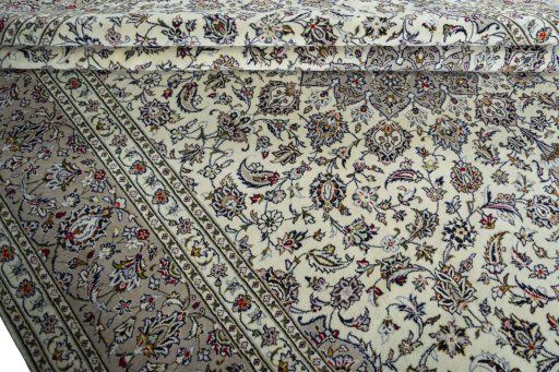 Close-up detail of 2000s Kashan rug from Iran / Persia showing Wool weave
