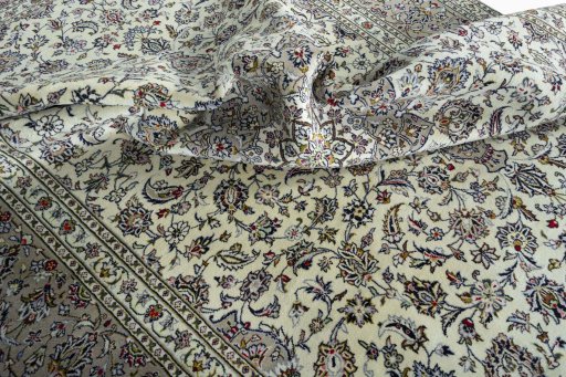 Surface texture of 2000s Kashan rug with natural Wool and intricate pattern