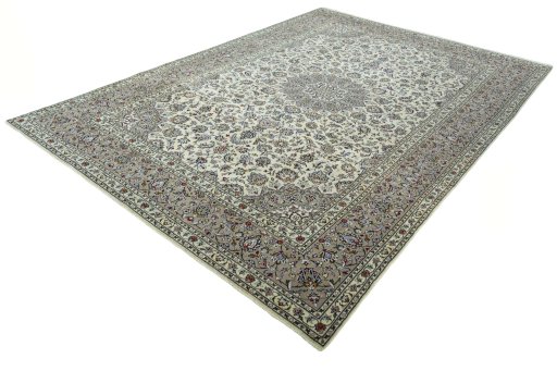 Corner detail of 2000s Kashan rug showing border pattern and Wool pile