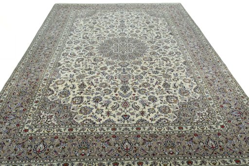 Surface texture of 2000s Kashan rug with natural Wool and intricate pattern